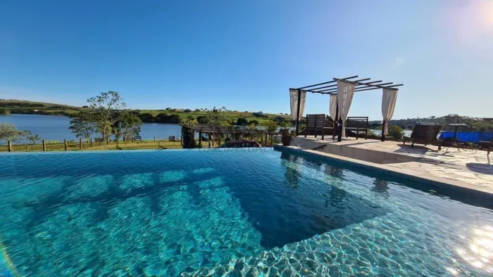 Sobrado à venda no Ecovillas do lago, terreno molhado, com 4 suítes, piscina aquecida e tr