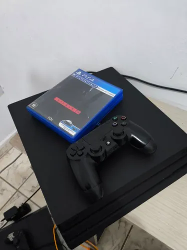 Ps4 pro 2 controles e 2 jogos em até 12x