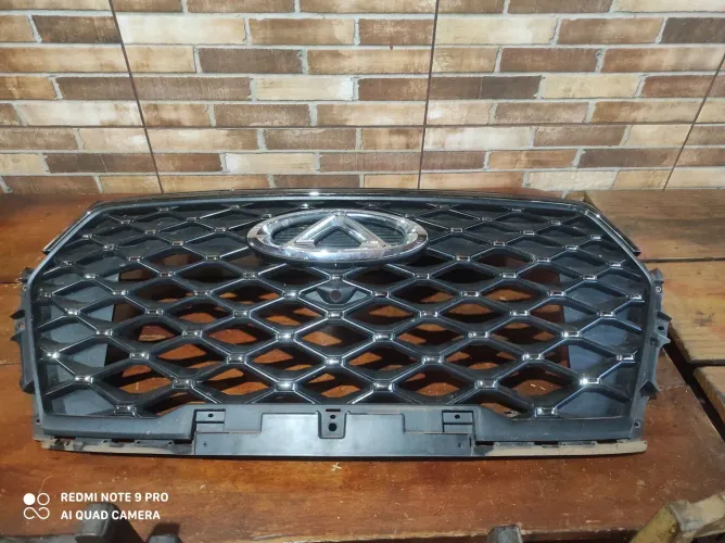 Grade superior Tiggo 7 2023/25 com detalhe