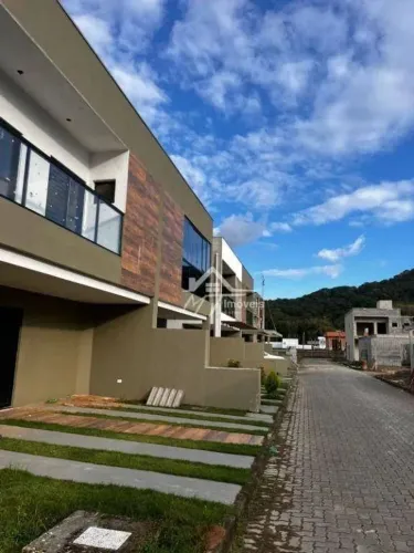 Casa com 3 dormitórios à venda, 156 m² por R$ 850.000,00 - Jardim Carolina - Ubatuba/SP