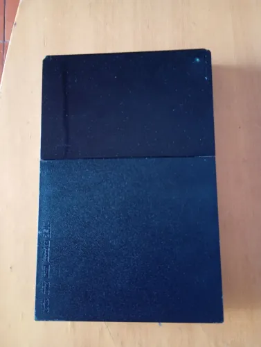 Playstation 2- lendo jogos ( leitor um pouco levantado) envio Olx play
