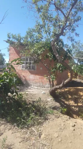 Vendo casa com terreno
