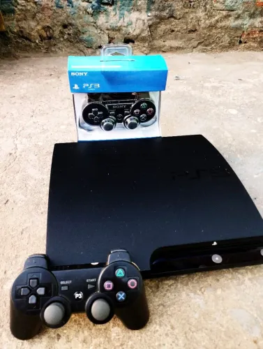 PS3 Slim + 40 jogos
