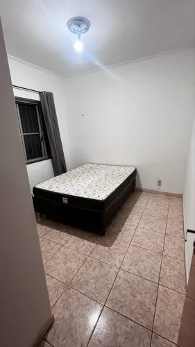 Quarto em casa compartilhada