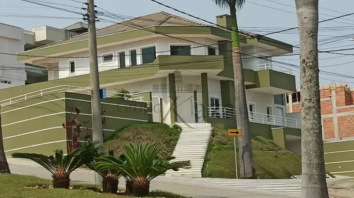 Casa em Condomínio - Condomínio Residencial Jaguary - 5 Dormitórios - 450m².