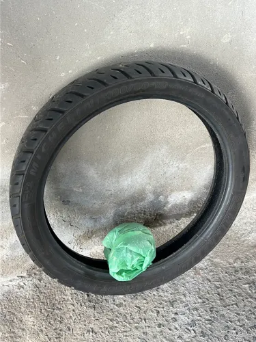 PNEU 80% E CÂMERA DE AR NOVA