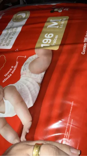Fralda huggies suprema care roupinha