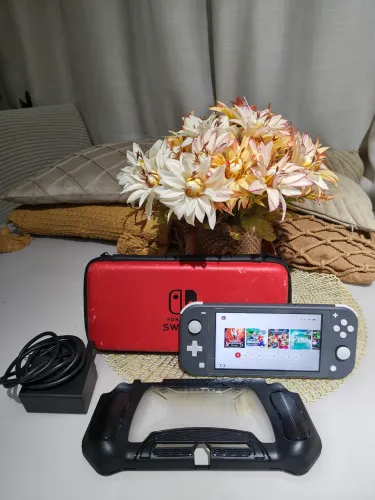 Nintendo switch lite d.e.s.b.l.o.q.u.e.a.d.o aceito cartão e trocas