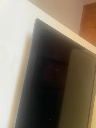 Televisão funcionando em bom estado