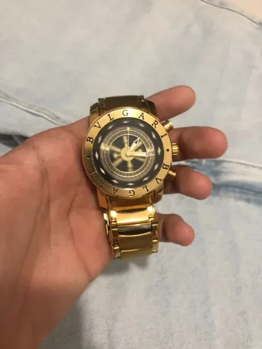 Relógio Dourado Bvlgari - Com Roleta Giratória Exclusiva