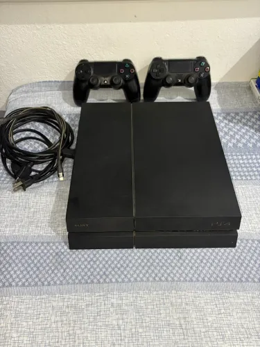 Ps4 500GB funcionando perfeitamente.  Chegar com mil é seu!