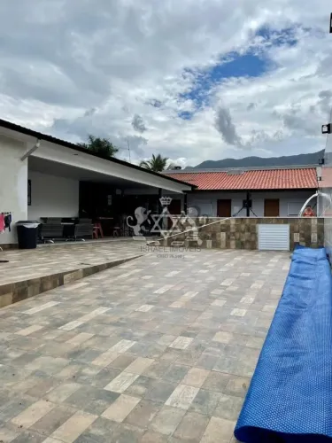 Casa com 4 suítes + piscina à venda, no Portal do Patrimonium, em Massaguaçu Caraguatatuba