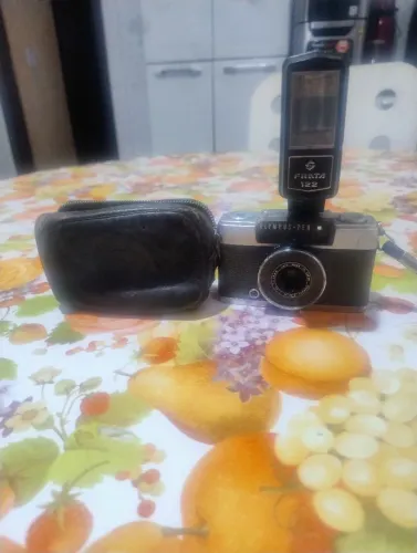 Máquina fotográfica 