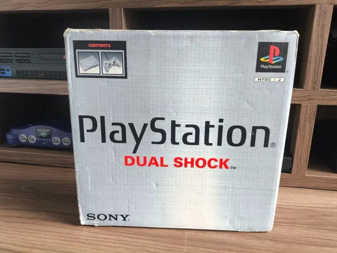 Playstation 1 Japonês em ótimo estado com manual lacrado 