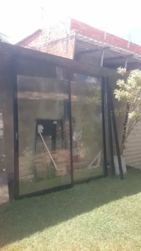 Porta de vidro As duas partes móvel Altura 2,34 2,15 largura Valor 1.300 *77