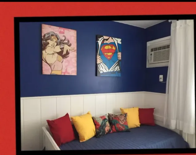 Quadro super man e mulher maravilha 