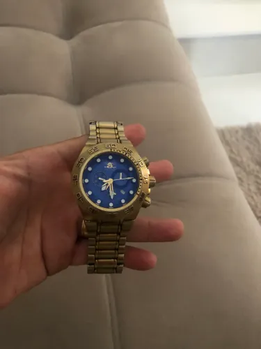 Vendo invicta preço baixo pra vender rápido.