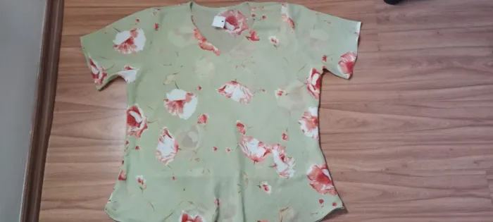 Blusa verde estampada GG