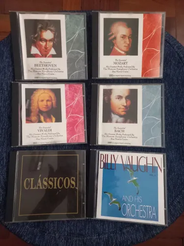 6 CDs músicas clássicas: Beethoven,Mozart,Vivaldi,Bach,Luciano Pavarott e Billy Vaughn .