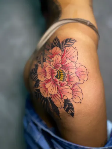 Troco tatuagem por câmera Cânon ou Nikon