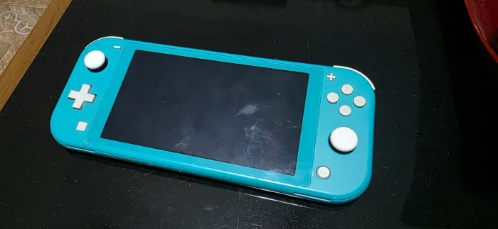 Nintendo Switch Lite - No estado/Retirada de peças 