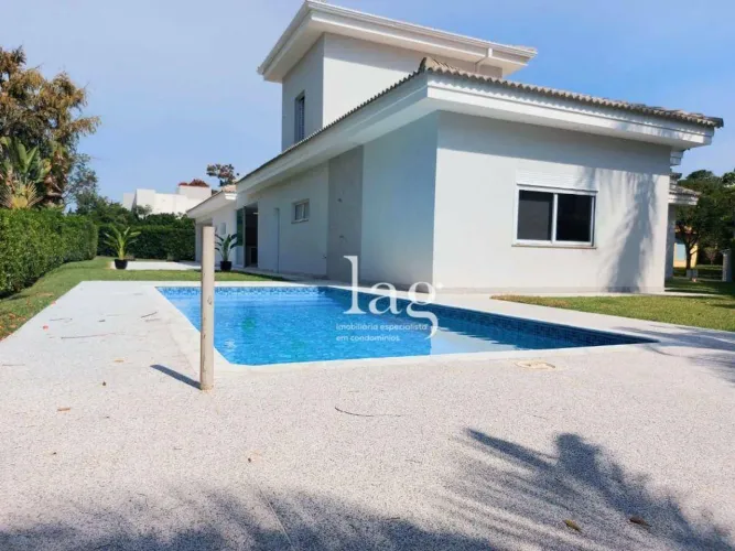 Casa com 4 quartos, 495 m² - venda por R$ 4.500.000 ou aluguel por R$ 18.400/mês - Condomí