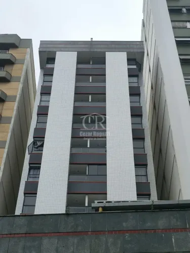 Quarto e Sala com vaga de Garagem no Centro !