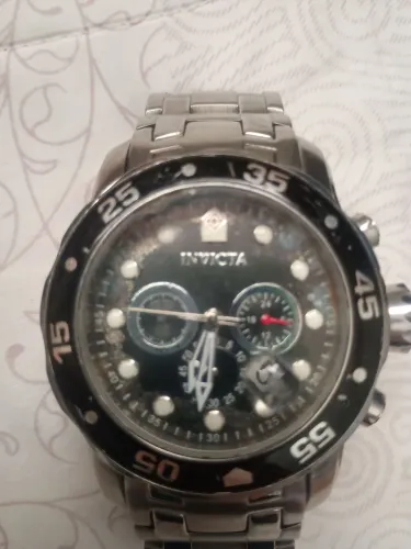 Vendo relógio masculino,bom estado,marca invicta