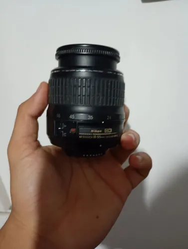 Lente Nikon 18mm-55mm com defeito no diafragma 