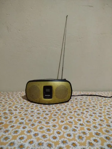 Vendo som Philips Az392 com problema do botão de passar a música