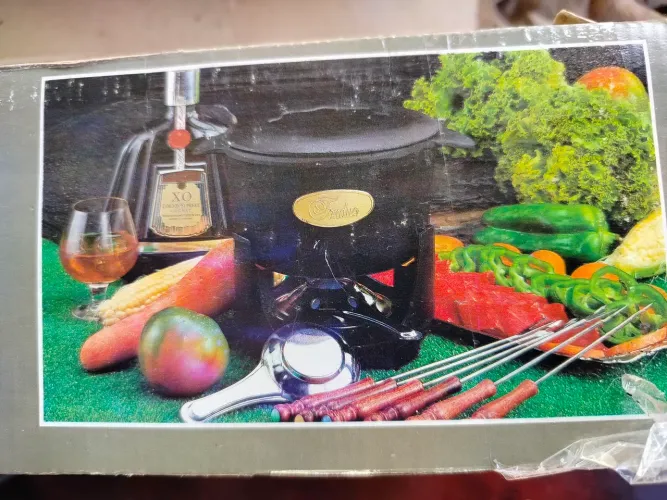 Aparelho de fondue vintage em ferro fundido 