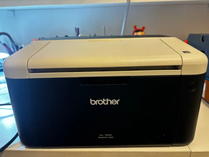 Impressora Brother laser -HL 1202- monocromática- defeito