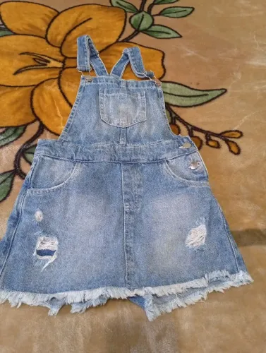 Jardineira shorts saia jeans Marisa kids 