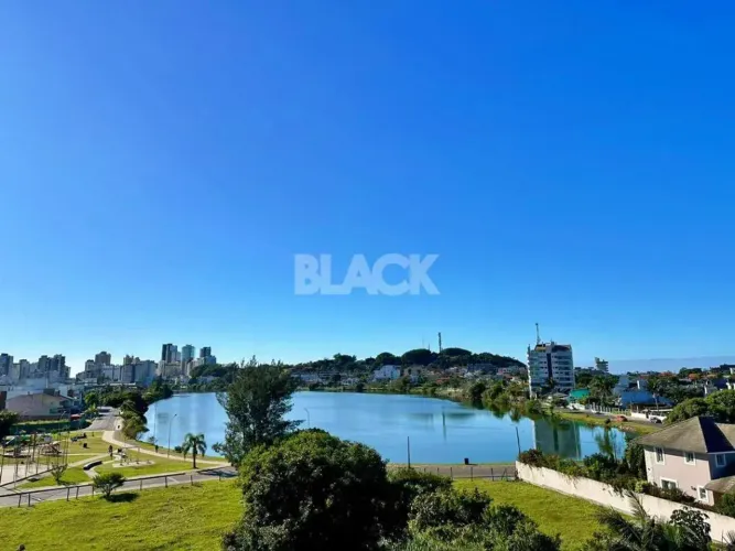 Apartamento com sacada e vista Lagoa do Violão, semi-mobiliado - Centro, Torres - RS