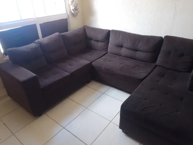Vendo sofá de canto grande, em boas condições.