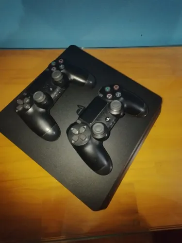 Ps4 semi-novo 2 controles 1terabytes