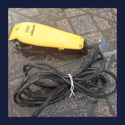 Máquina de cortar cabelo Wahl + 1 pente (buscar/enviar app no Marco, Pix) R$50,00