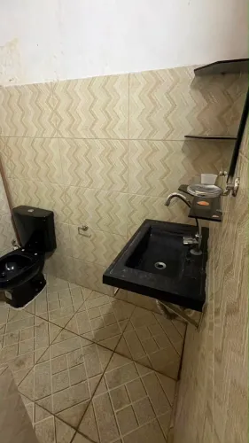 Alugo casa no bairro Aparecida R$: 1.300