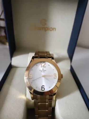 Relógio Champion dourado