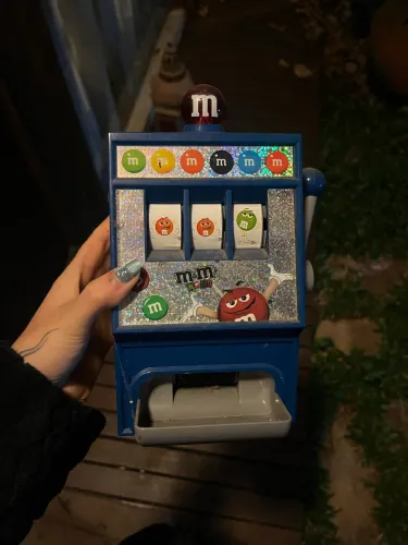 Caça Níquel de M&Ms original de Orlando