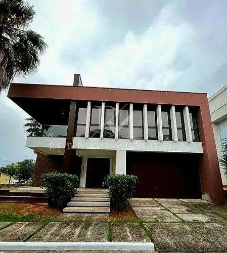 Casa com 3 suítes à venda no Cacupé, Florianópolis, com vista para o mar