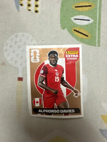 figurinha extra sticker alphonso davies bronze