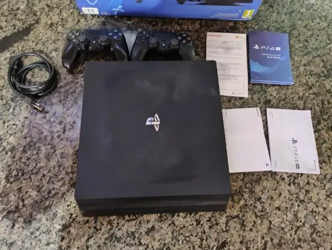 Playstation 4 pró+ 2 controles+ cabos + caixa