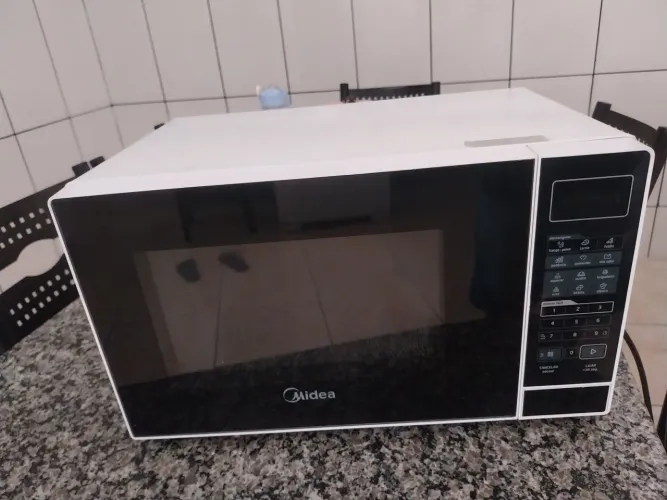 VENDO micro-ondas e uma istufa na caixa