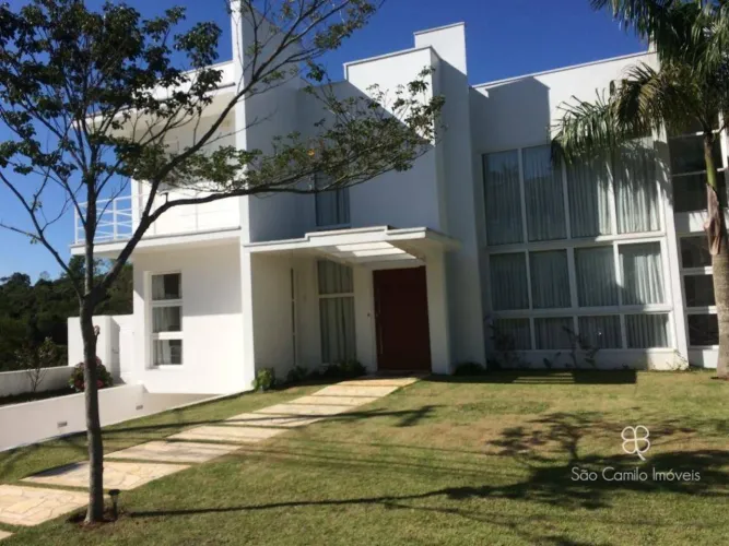Casa com 5 suítes, 566 m² - venda por R$ 4.500.000 ou aluguel por R$ 21.269/mês - Parque d