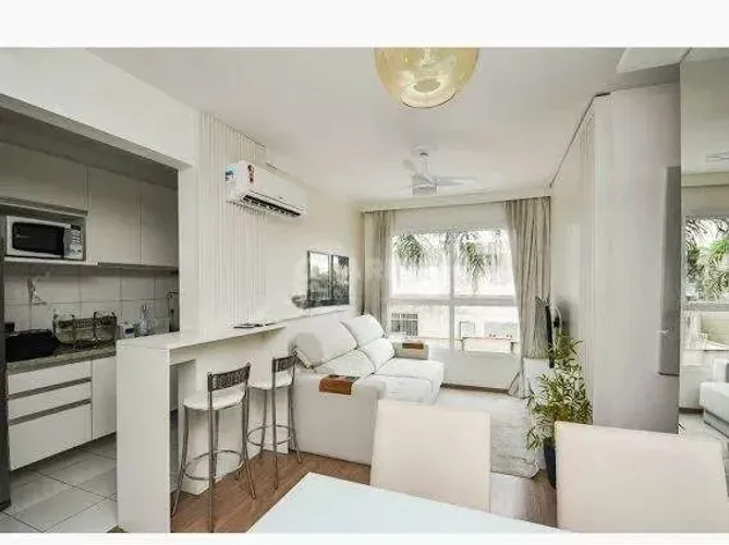 Apartamento mobiliado com 2 dormitórios, sendo 1 suíte, no bairro Cavalhada.