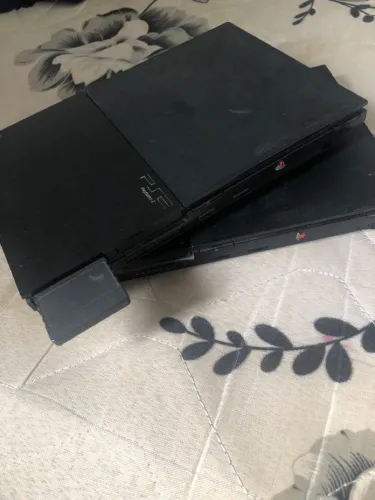 2 ps2 slim,3 controles (1 paralelo) e os cabos