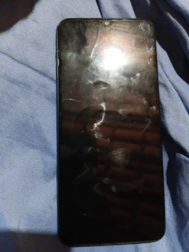 Celular a03s, muito bom, acompanha carregador, película e capinha