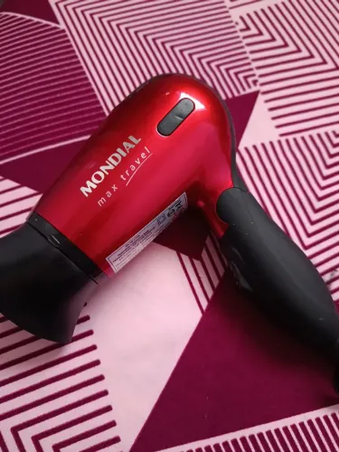 Secador mondial Max bivolt, funcionando normalmente e a temperatura é ótima!