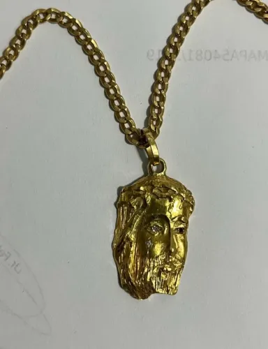 Corrente e pingente de ouro 18k 750 - 29 gramas comprovada na balança.